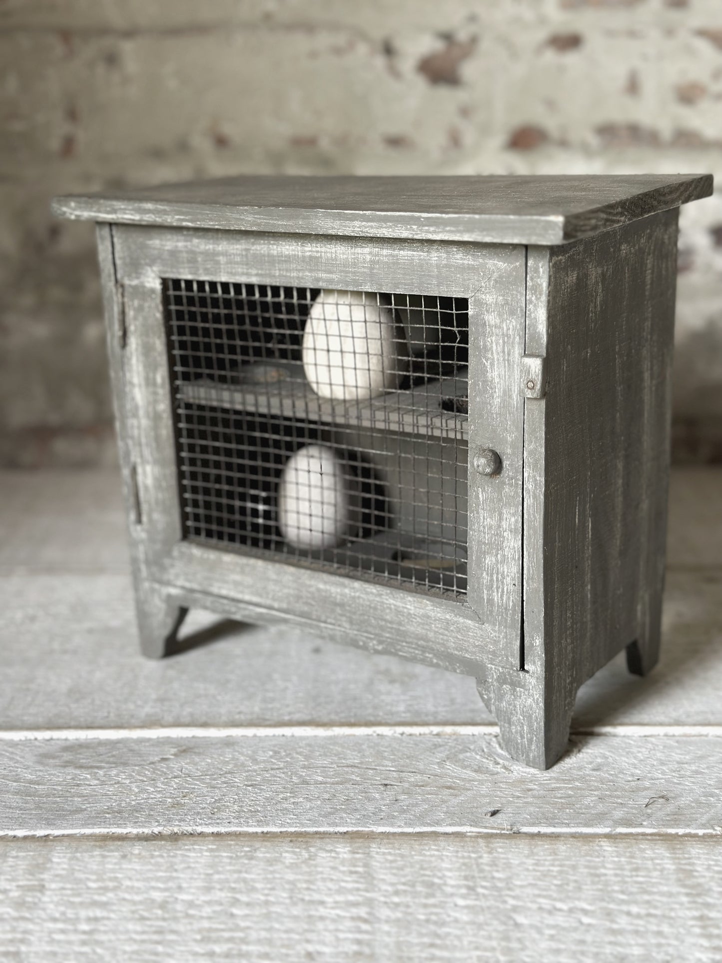 A vintage French chicken wire egg safe or egg cupboard egg holder egg rack