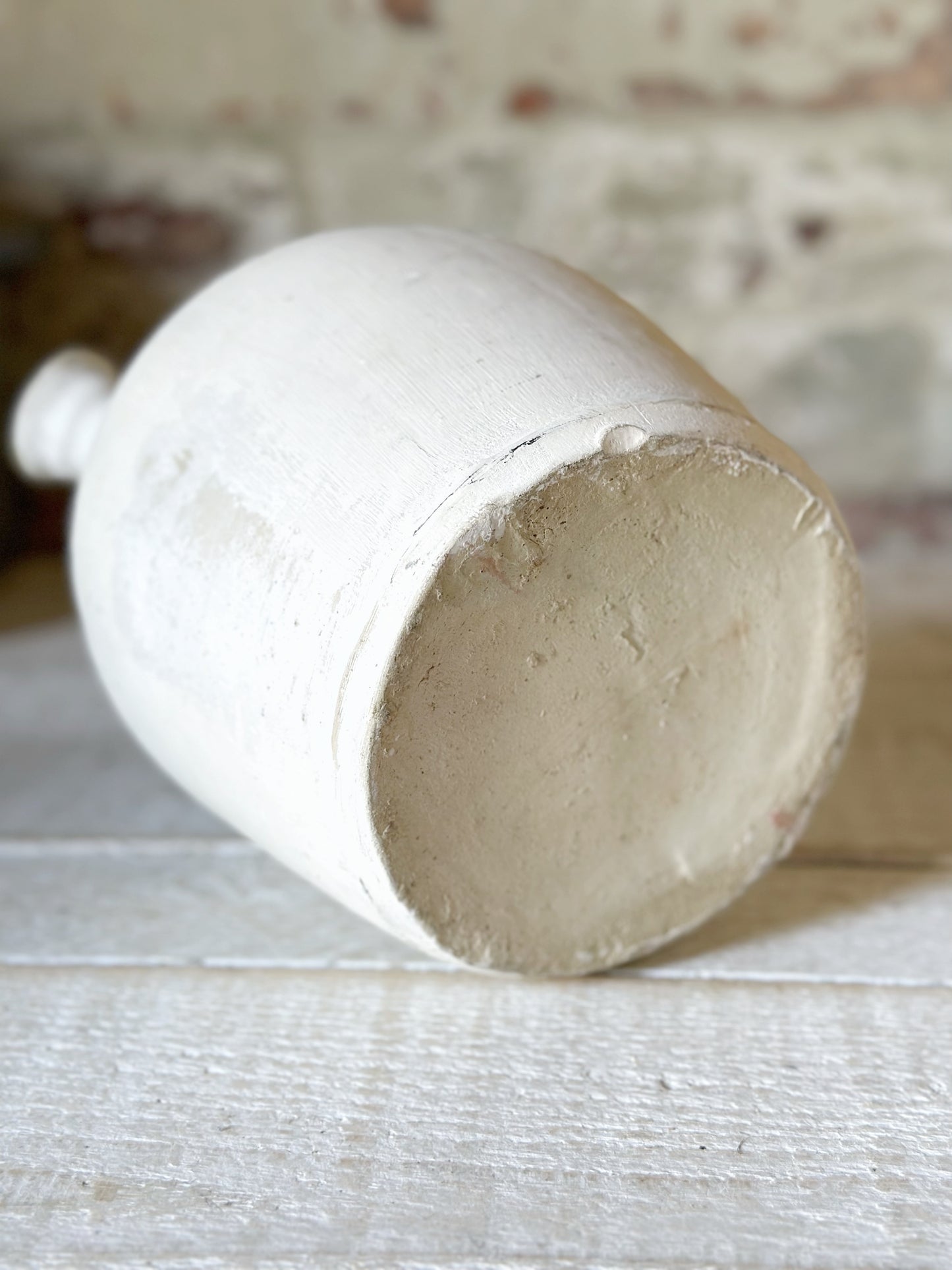 A vintage French stoneware gargoulette water bottle