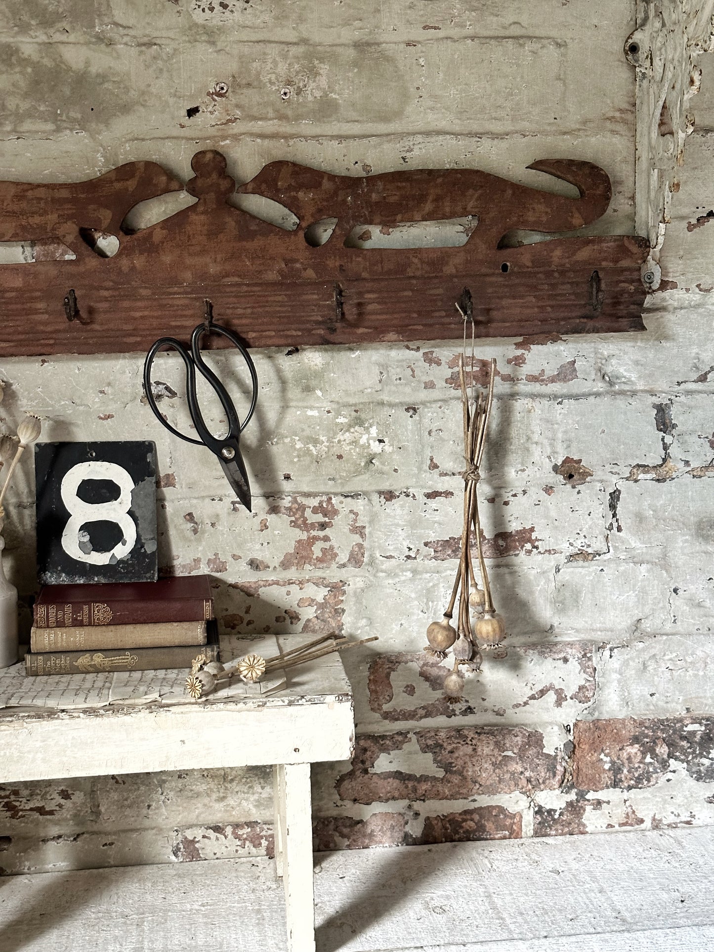 Antique primitive wooden game rack with stylised foxes