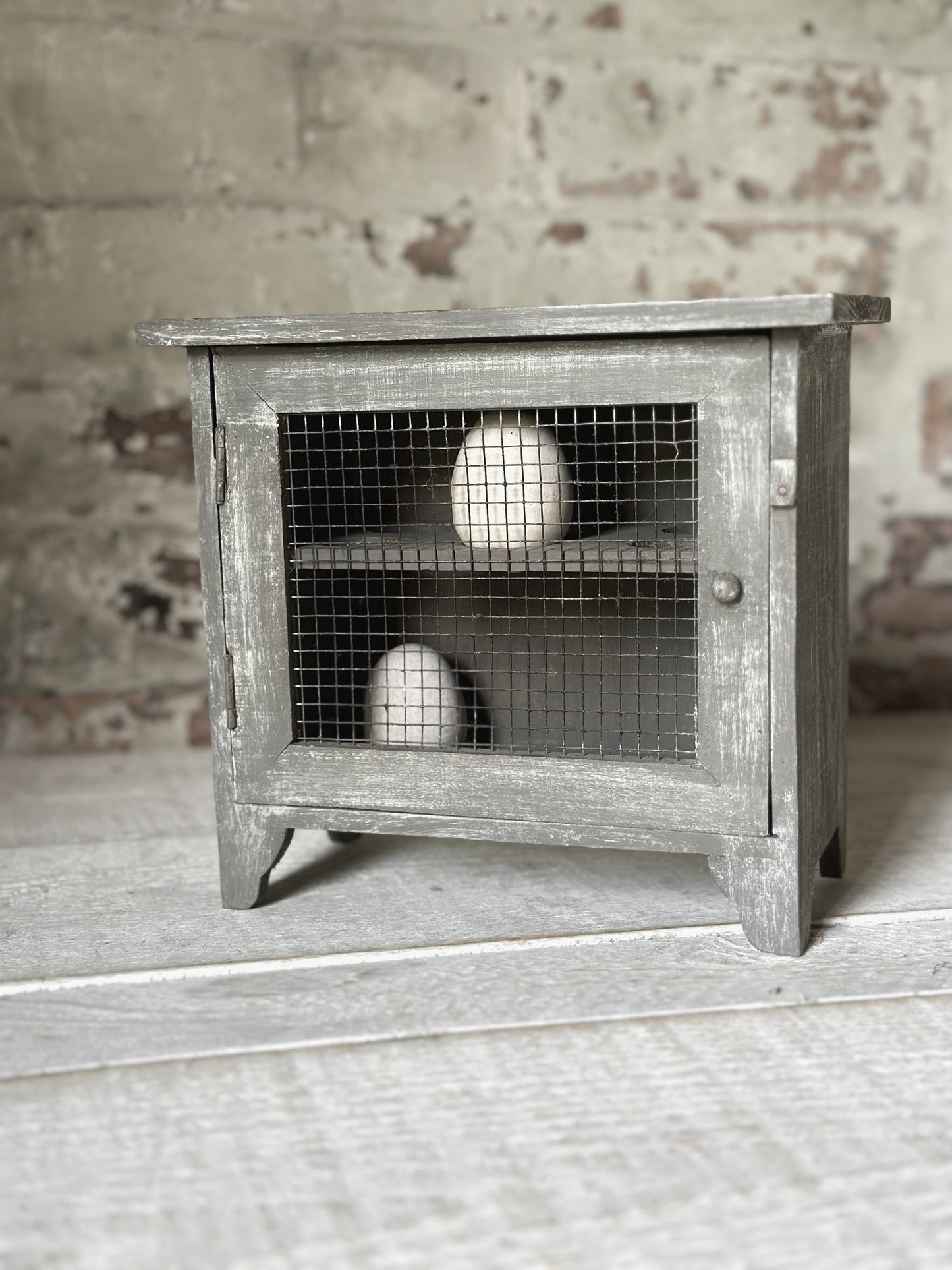 A vintage French chicken wire egg safe or egg cupboard egg holder egg rack