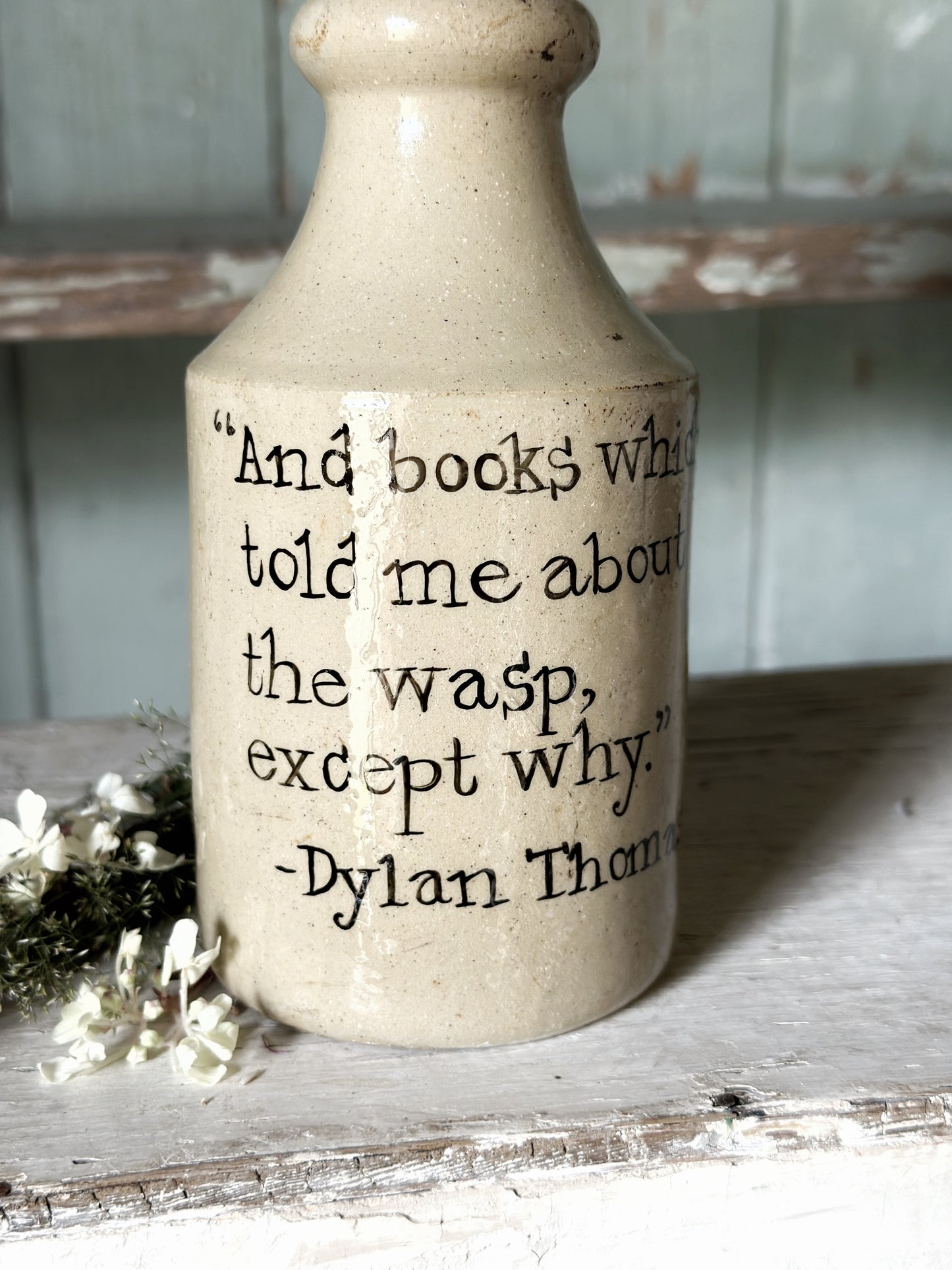 A Victorian unearthed stoneware pottery tall bottle with a hand painted quote