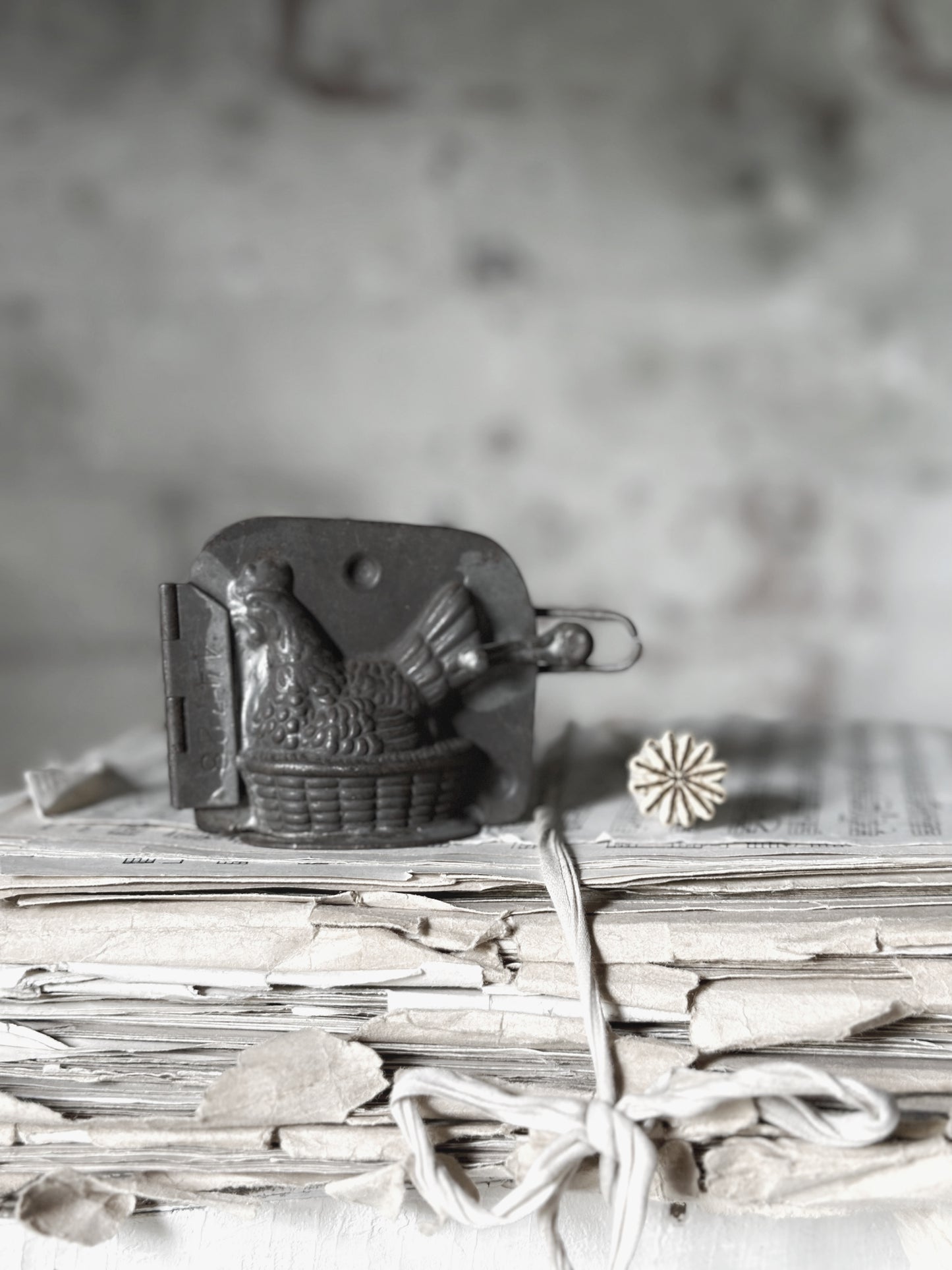 An Antique hinged chocolate mould hen