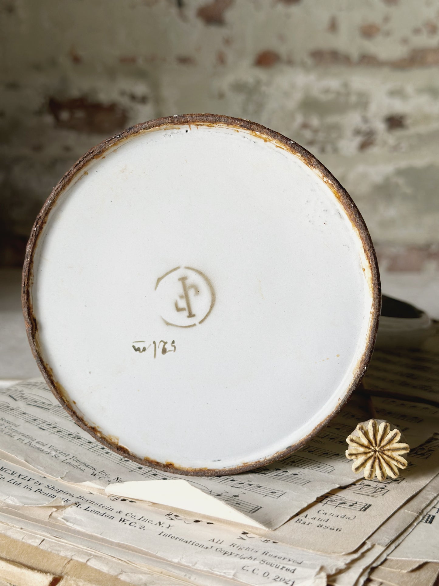 A beautiful French antique enamel jug with floral detail