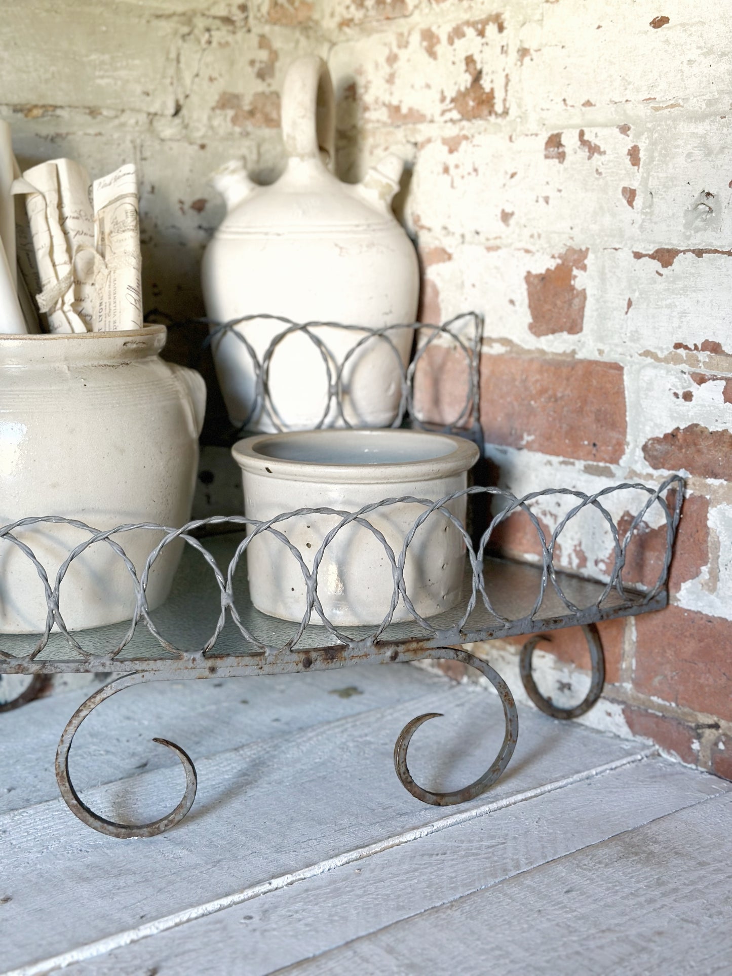 A vintage French stoneware gargoulette water bottle