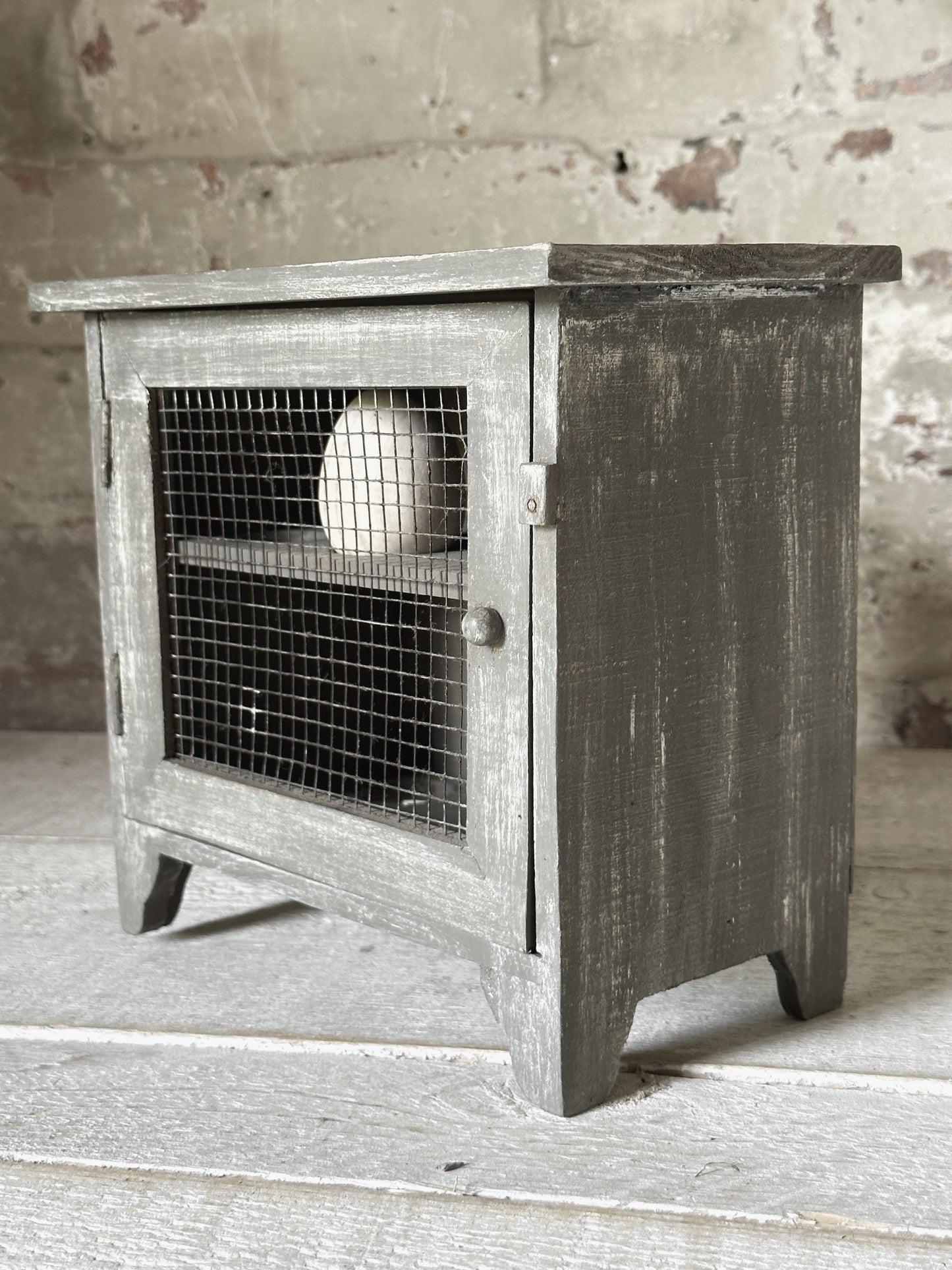 A vintage French chicken wire egg safe or egg cupboard egg holder egg rack