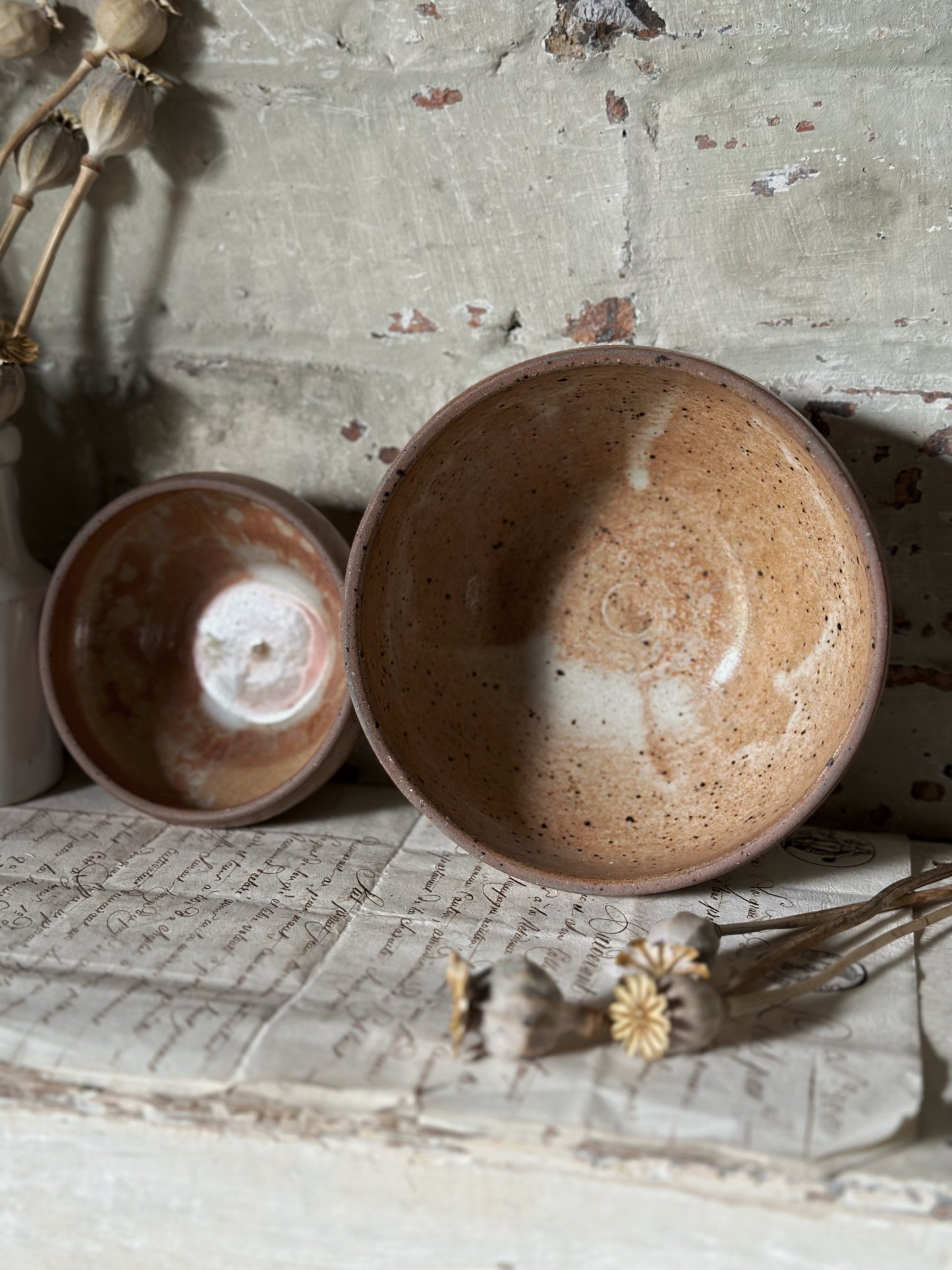 A pair of rustic antique French stoneware bowls