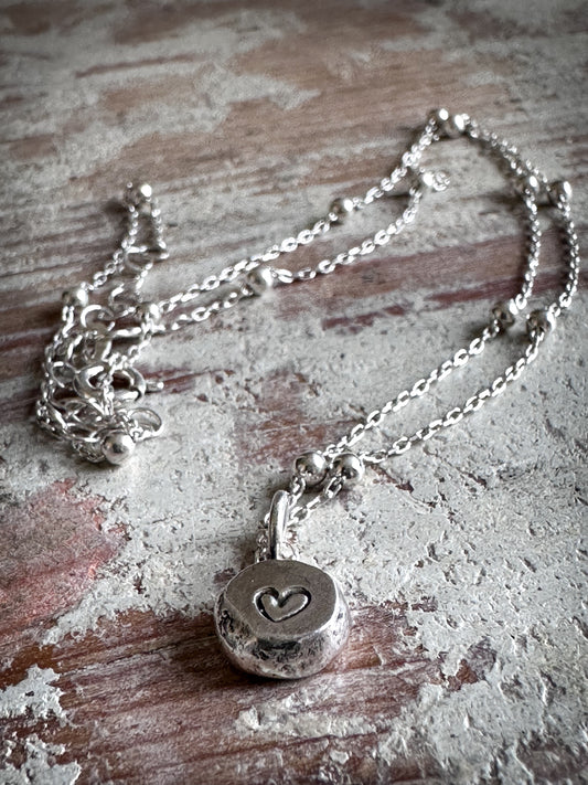 Moonlit Heart Pebble Necklace – Sterling Silver Heart Charm on Satellite Chain
