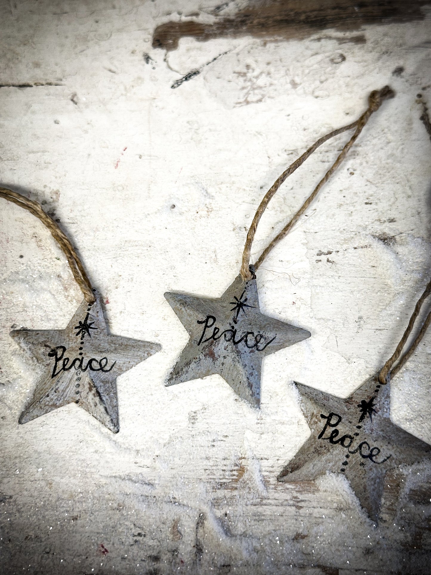 A Mini Grey Tin Barn Star Christmas Decoration “Peace”