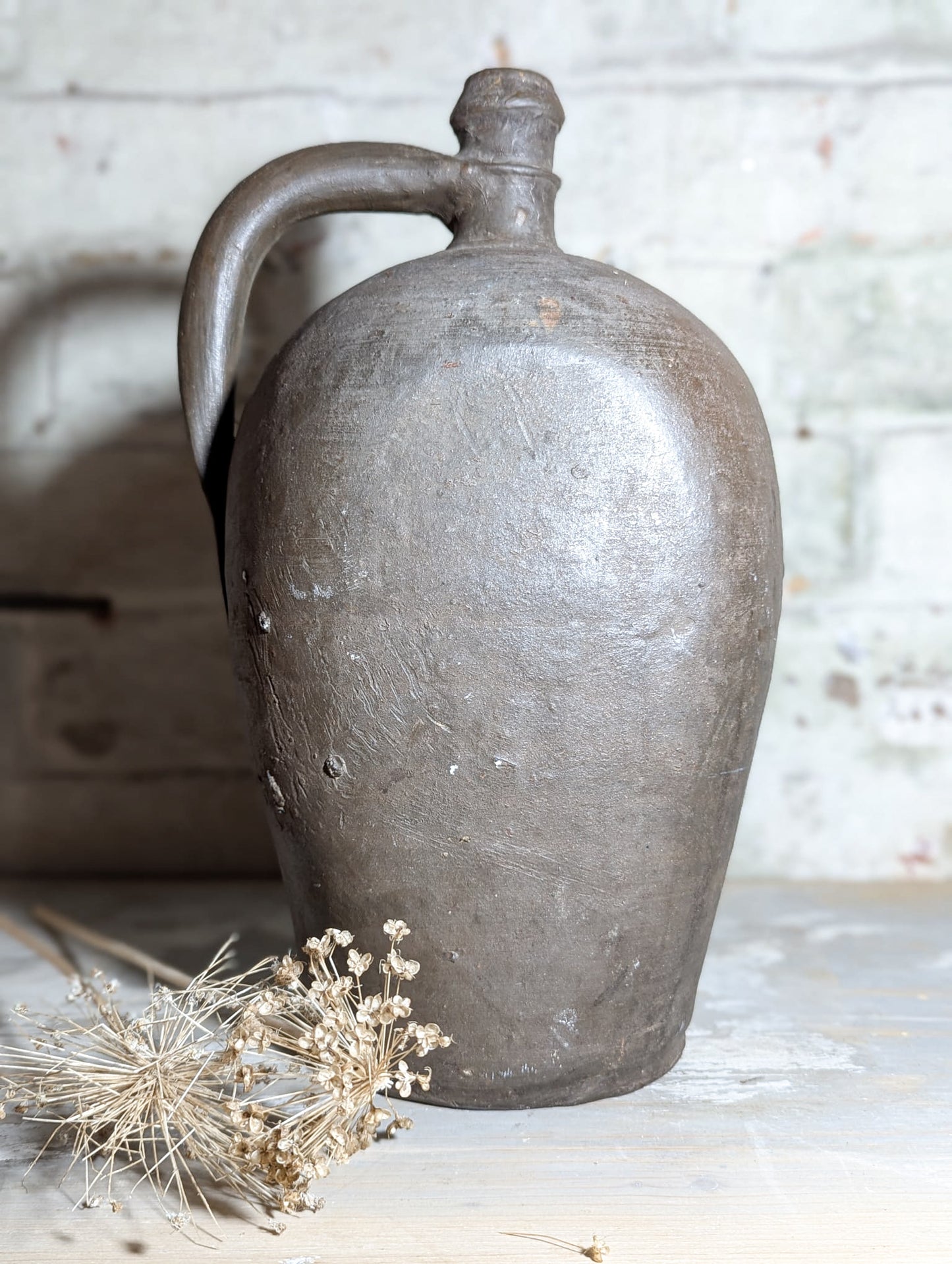 A stunning large Primitive French Antique Black Pottery oil bottle