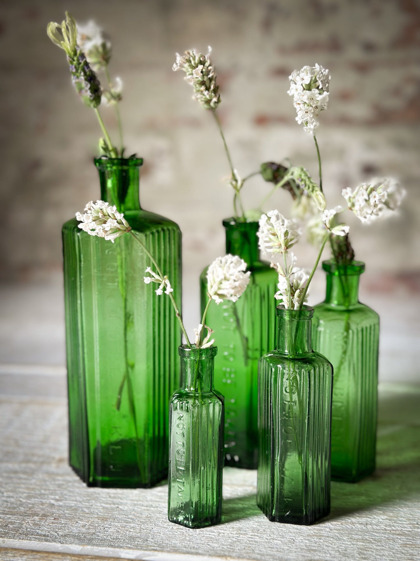 A set of Five lovely antique green poison bottles