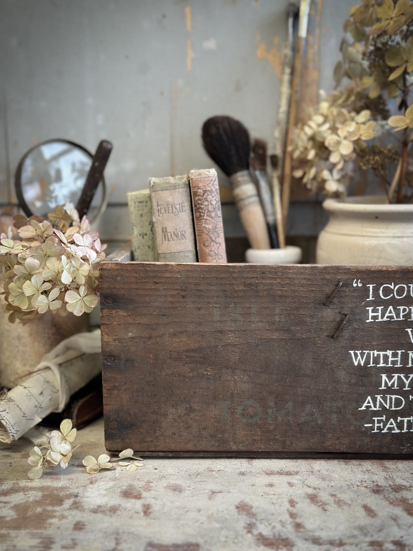 A Vintage Wooden Tomato Crate With Hand Painted Quote