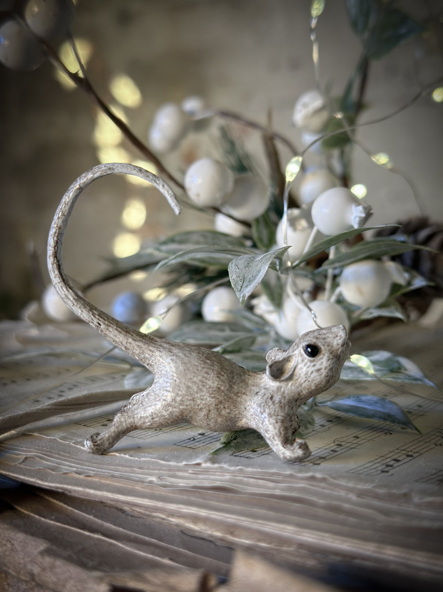 A cold painted brass “night before Christmas mouse”