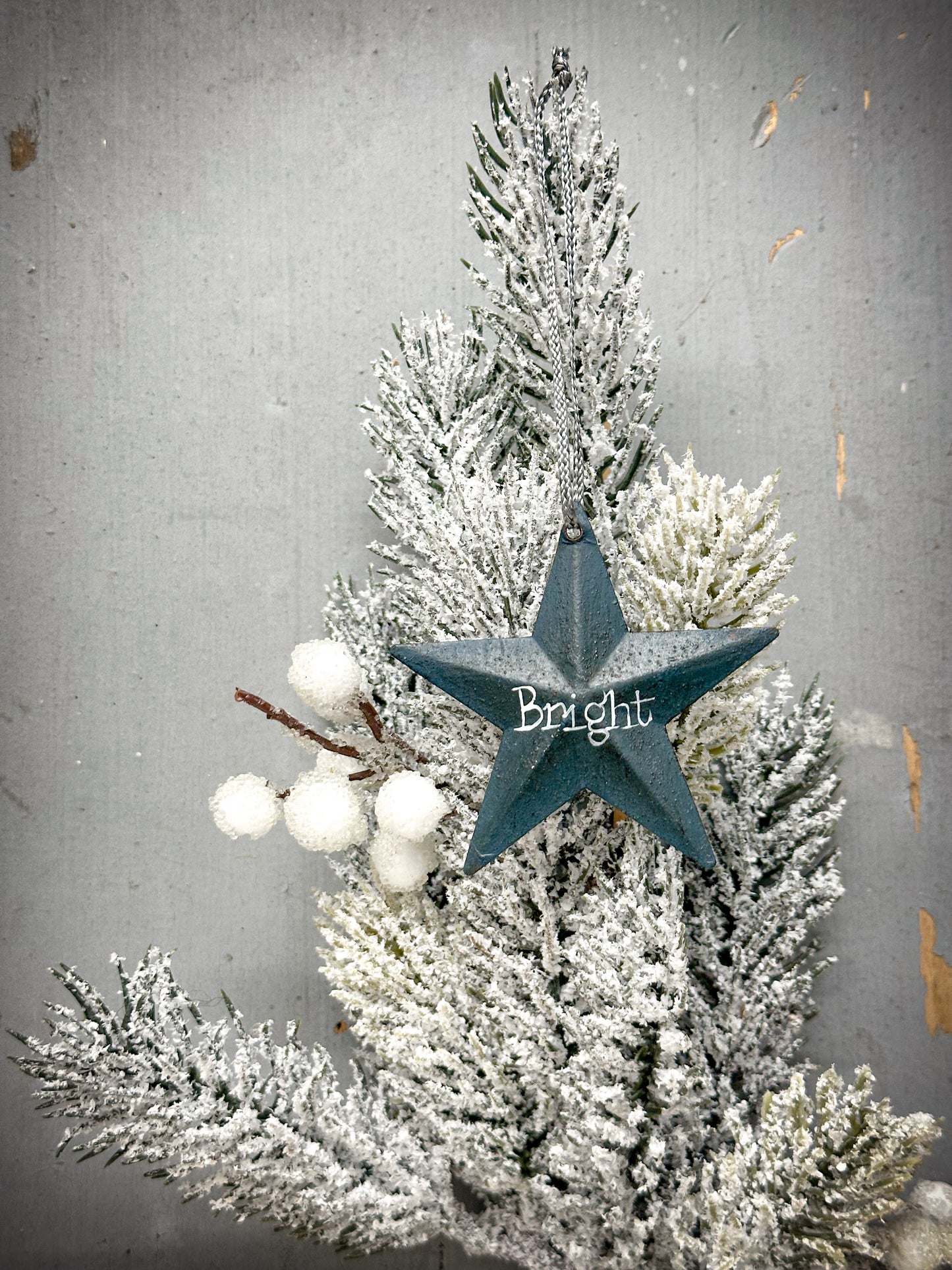 A medium Teal Tin Barn Star Christmas Decoration “Bright”