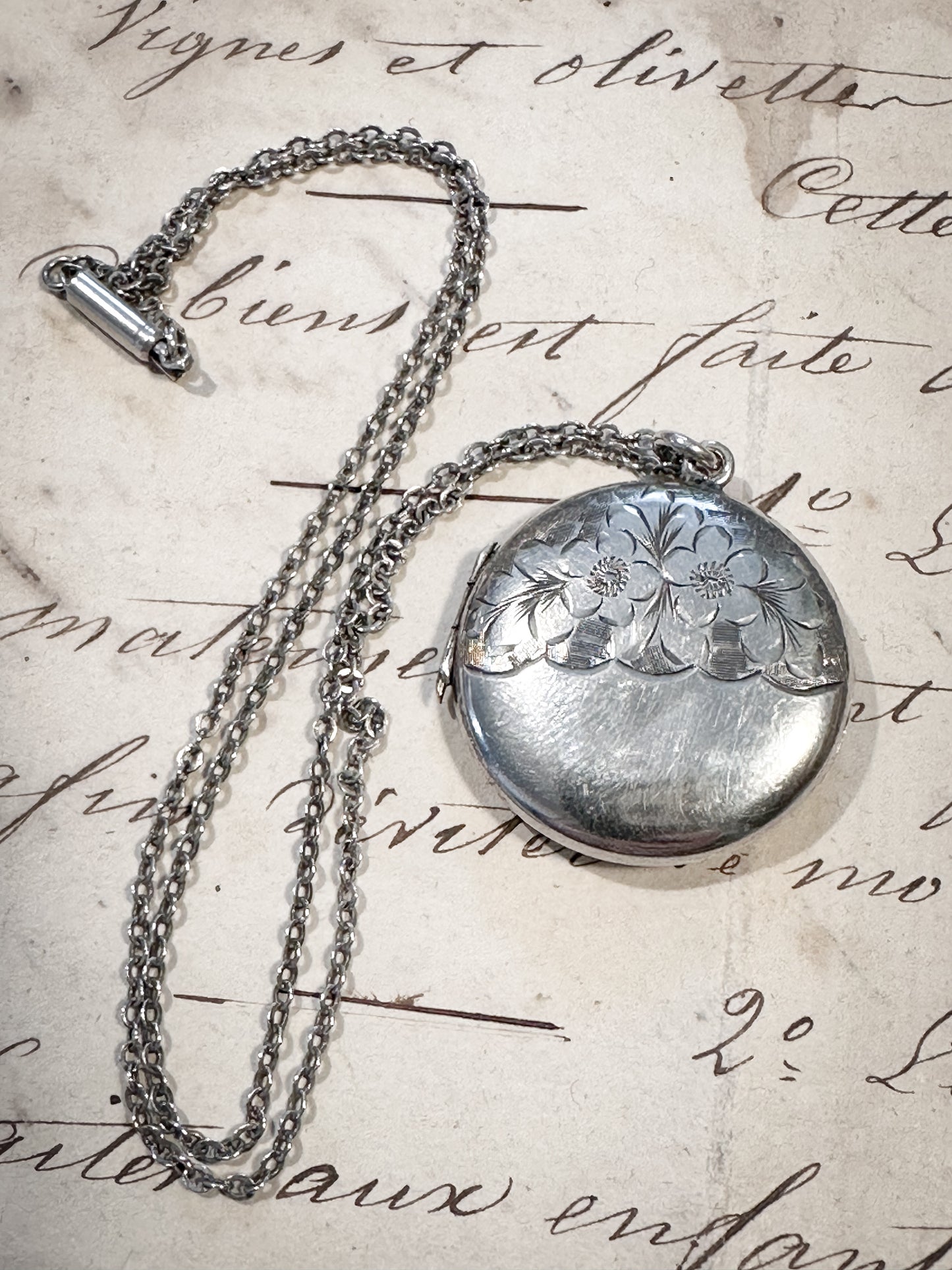 Antique silver Aesthetic movement locket and chain