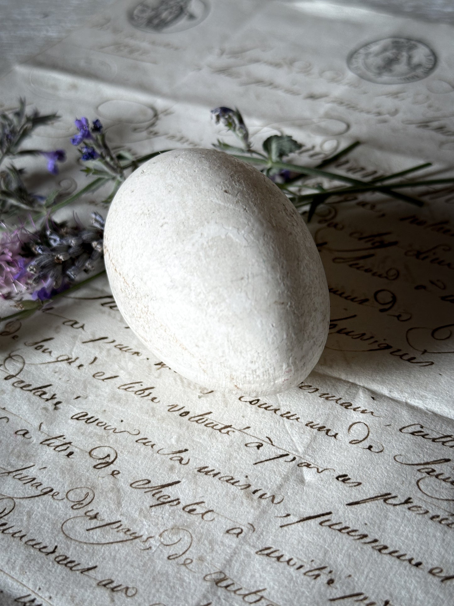 An original antique ceramic broody egg