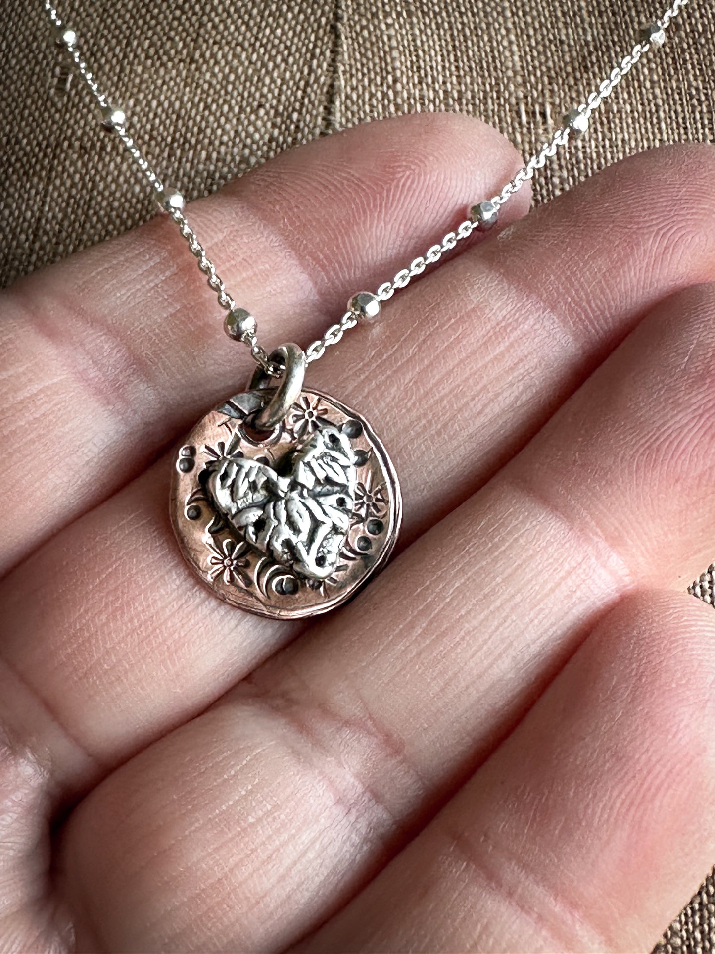 Moon Garden Heart Necklace – Fine Silver Wedgwood Sprig on Star-Stamped Copper