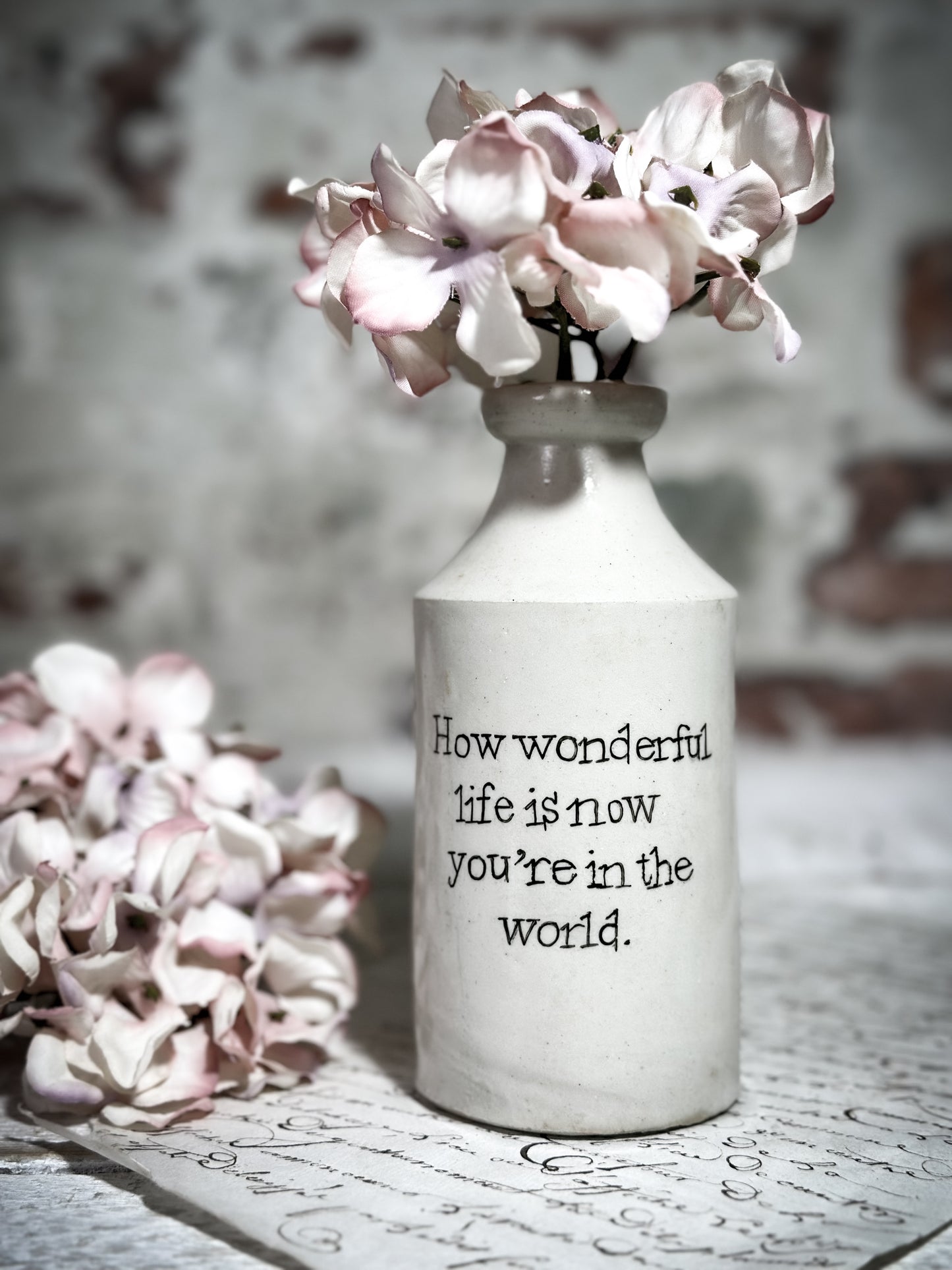 An Antique Pottery Bottle with a Hand Painted Valentine’s Day Quote