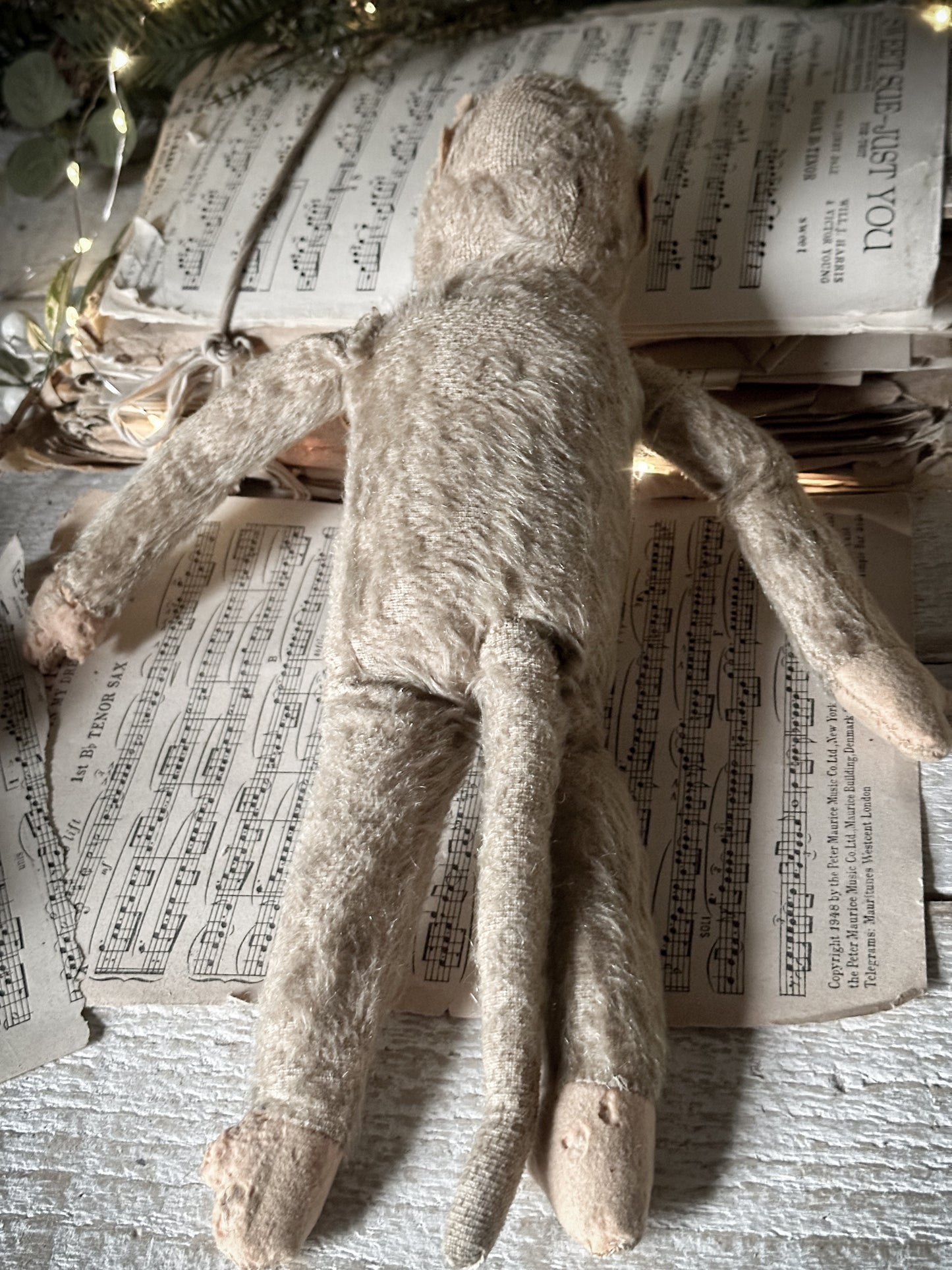 A lovely antique mohair monkey toy