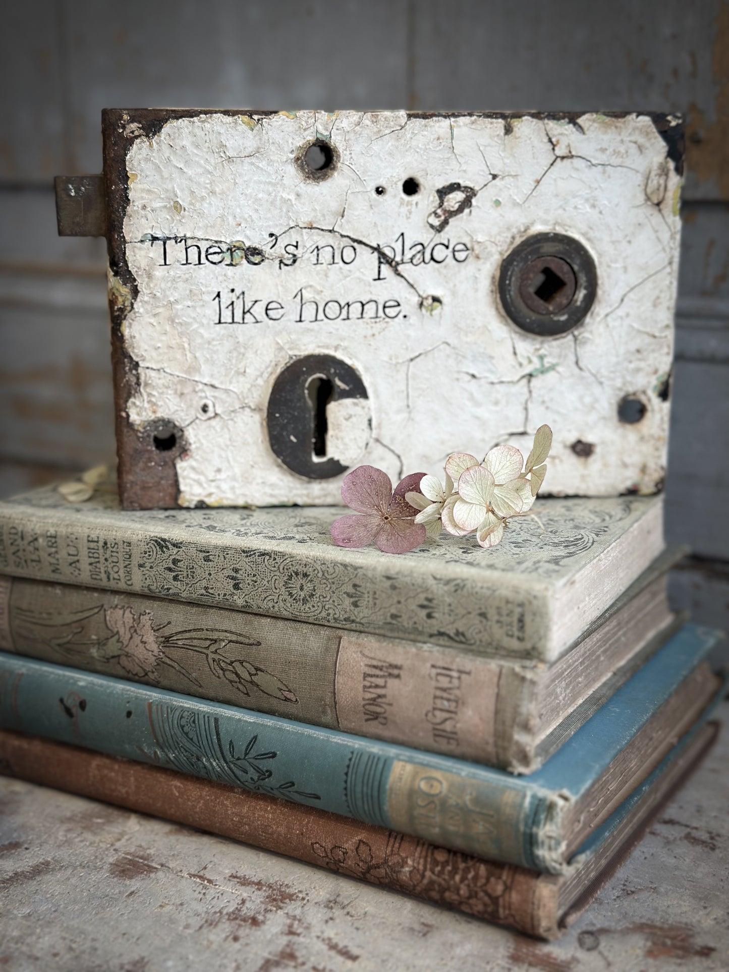 An Antique Lock With Hand Painted Quote