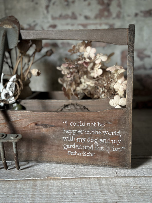 A pretty vintage wooden garden trug with a hand painted quote