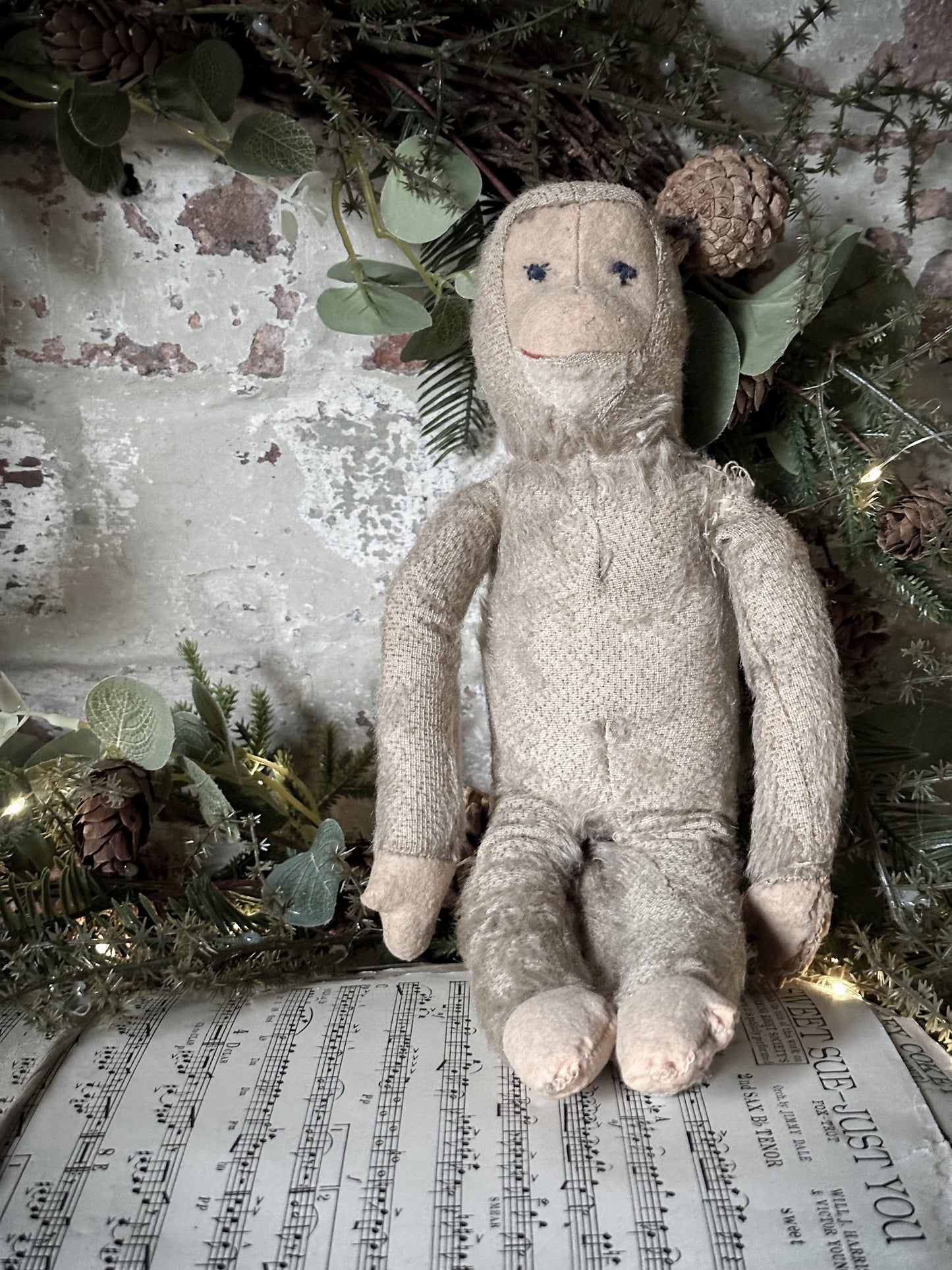 A lovely antique mohair monkey toy