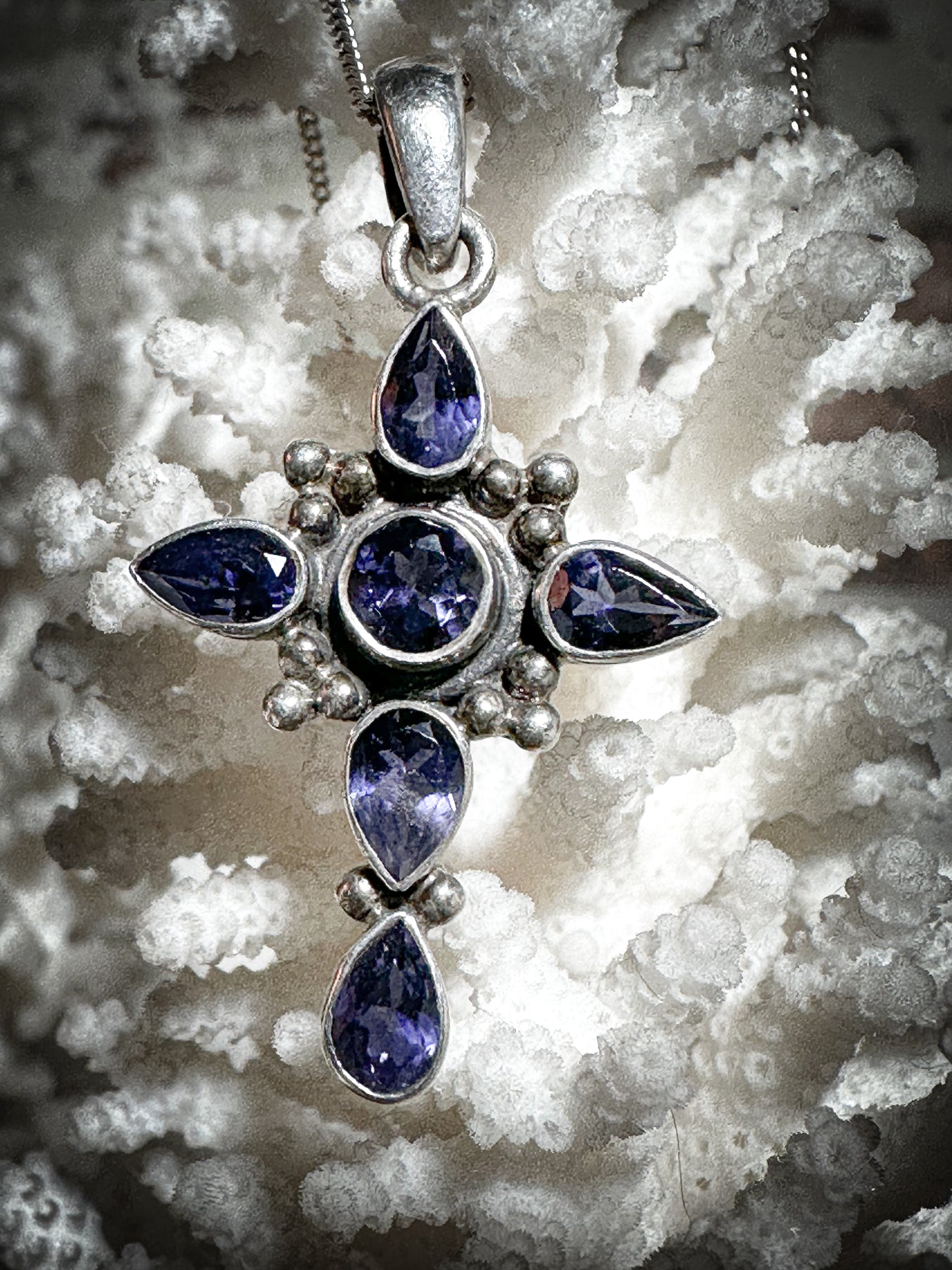 A vintage silver and Tanzanite crucifix