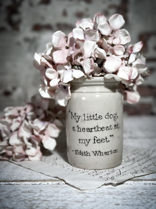 An Antique Jar with a Hand Painted Inspirational Quote