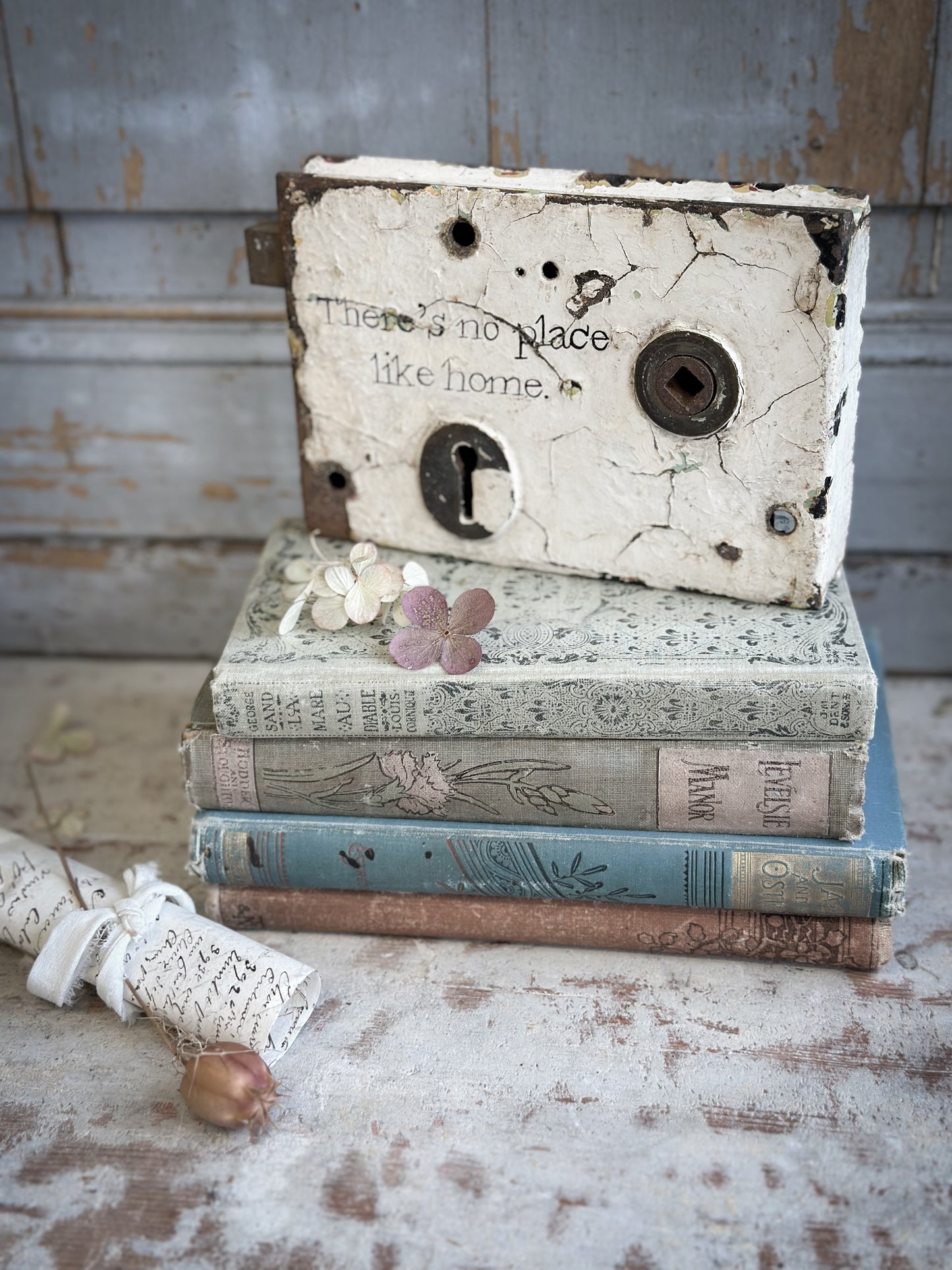 An Antique Lock With Hand Painted Quote
