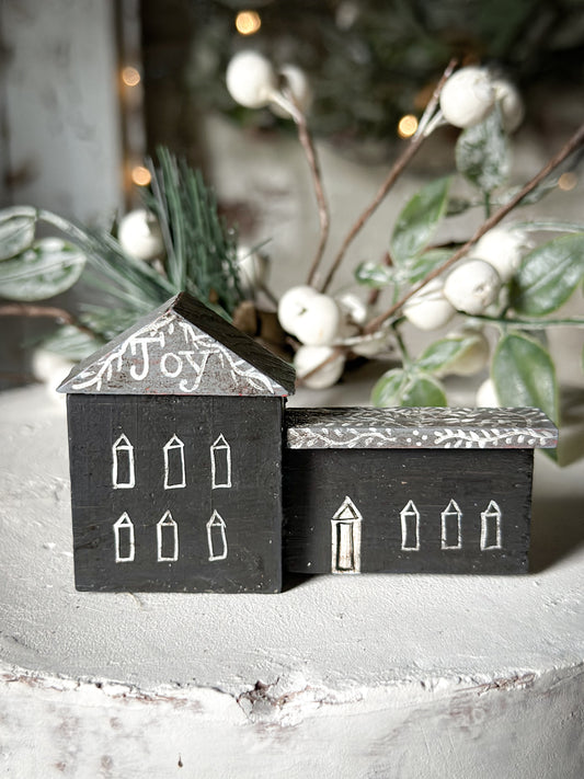 A pretty vintage German Erzgebirge Putz wooden village house painted with a Christmas quote