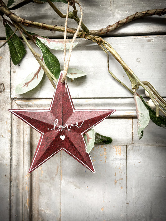 A Large Red Tin Barn Star Christmas Decoration “Love”