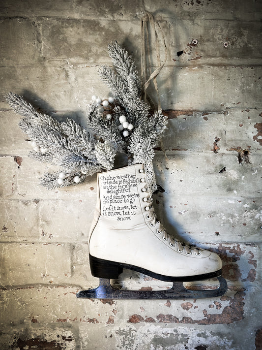 A beautiful vintage Christmas ice skate hand painted using traditional sign writer’s techniques and materials