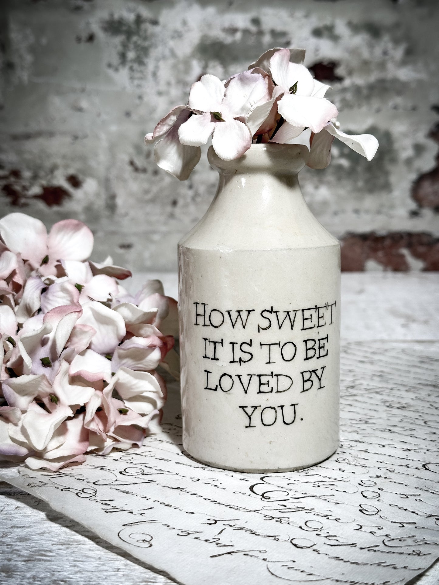 An Antique Bottle with a Hand Painted Inspirational Quote