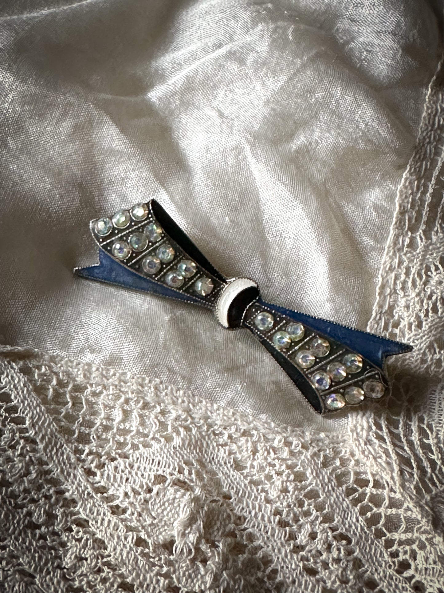 A beautiful white metal art Deco enamel pavé bar brooch