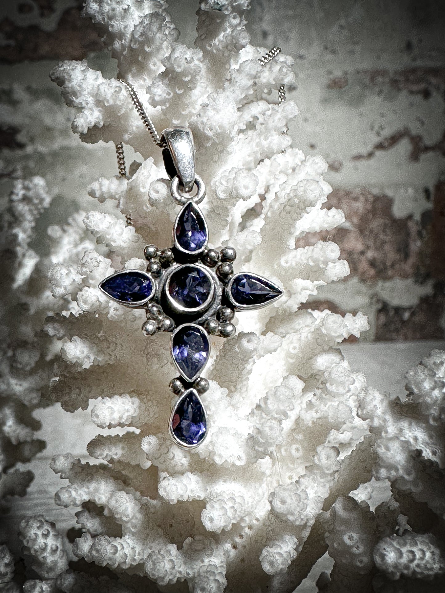 A vintage silver and Tanzanite crucifix