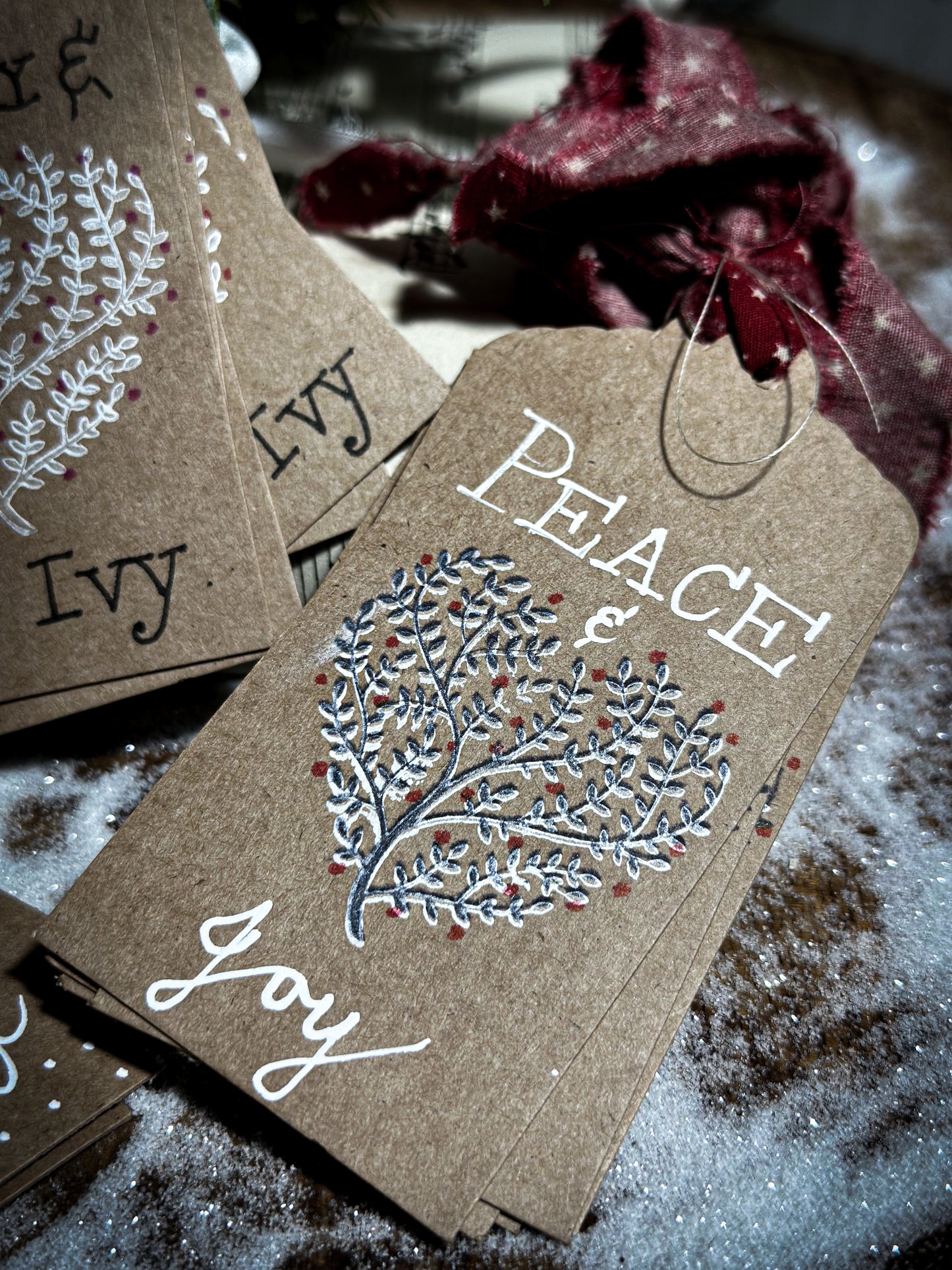 Pretty hand finished and illustrated gift tags with vintage French Fabric ties “Let it Snow”