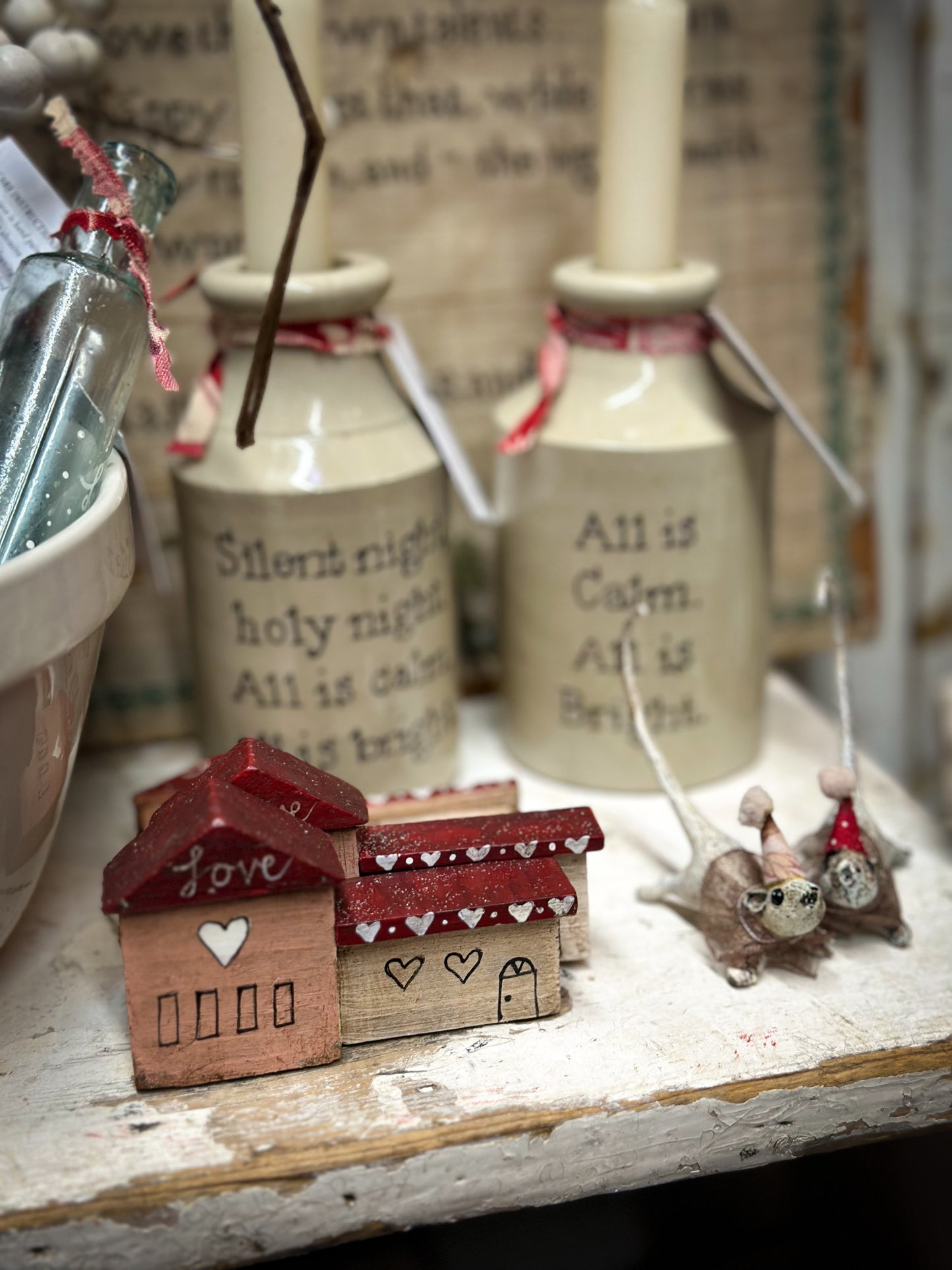 A cold painted brass “night before Christmas mouse” with a fabric ruffle and Christmas hat