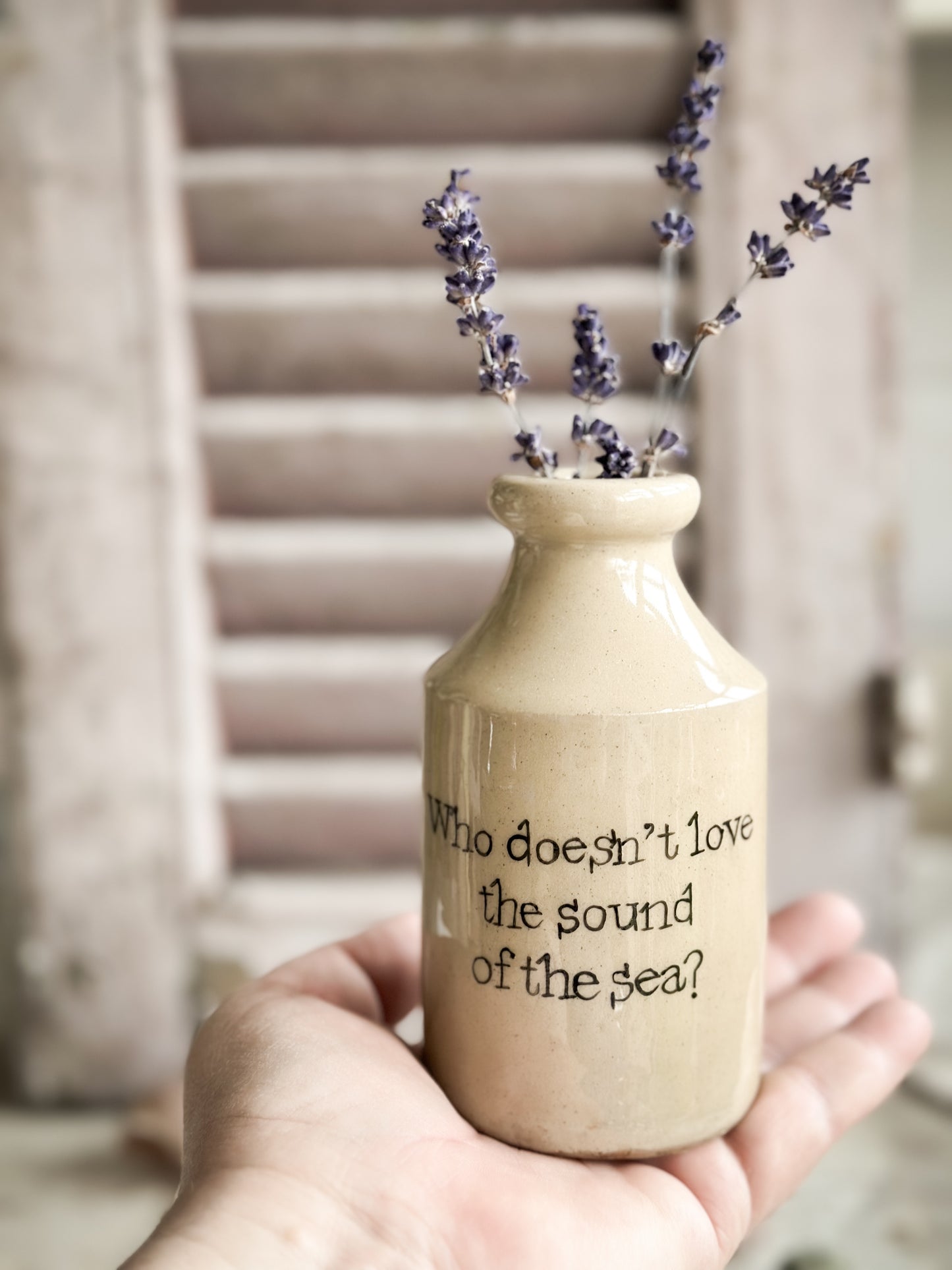A Victorian unearthed stoneware pottery bottle with a hand painted quote
