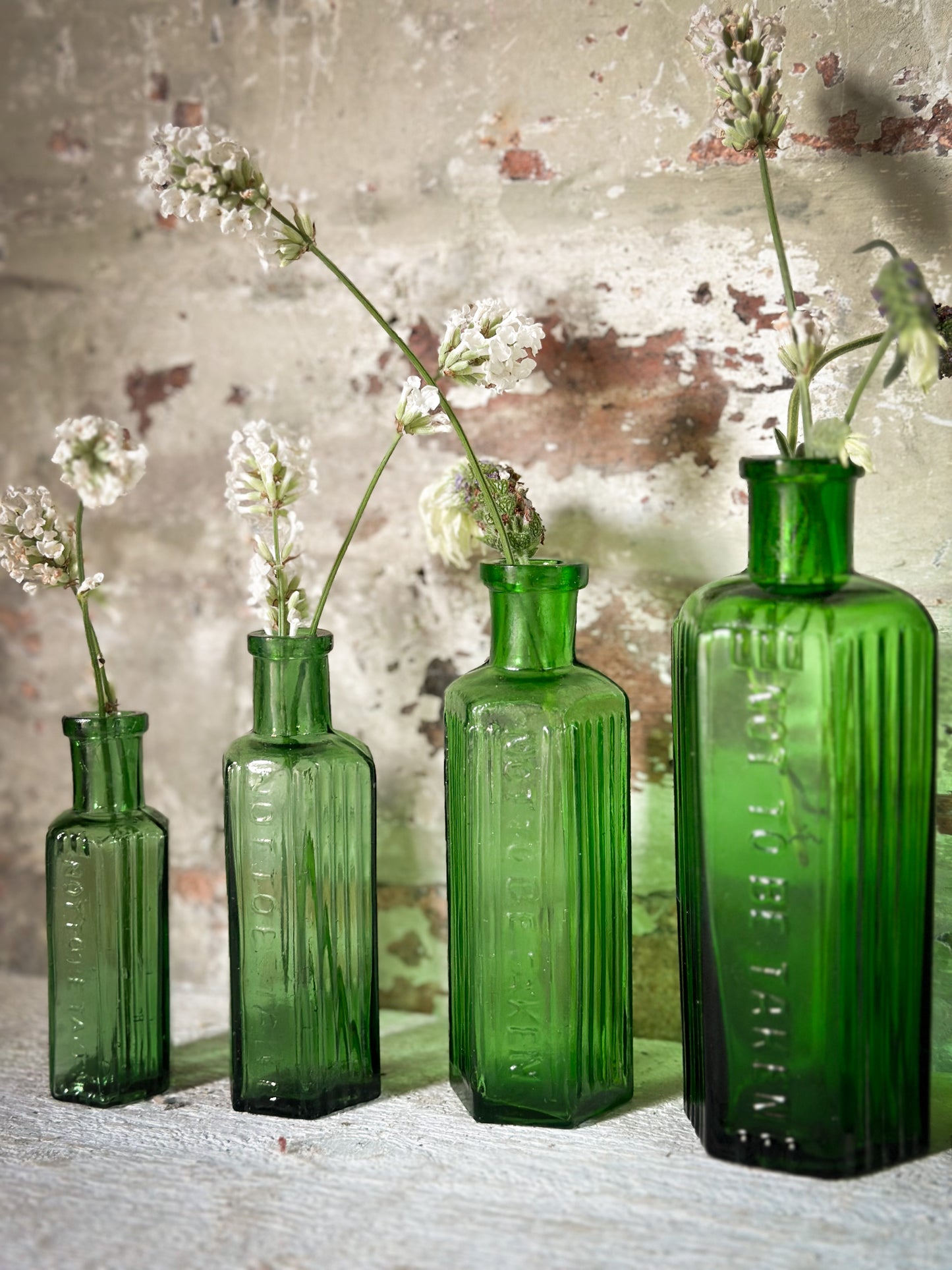 A set of Five lovely antique green poison bottles