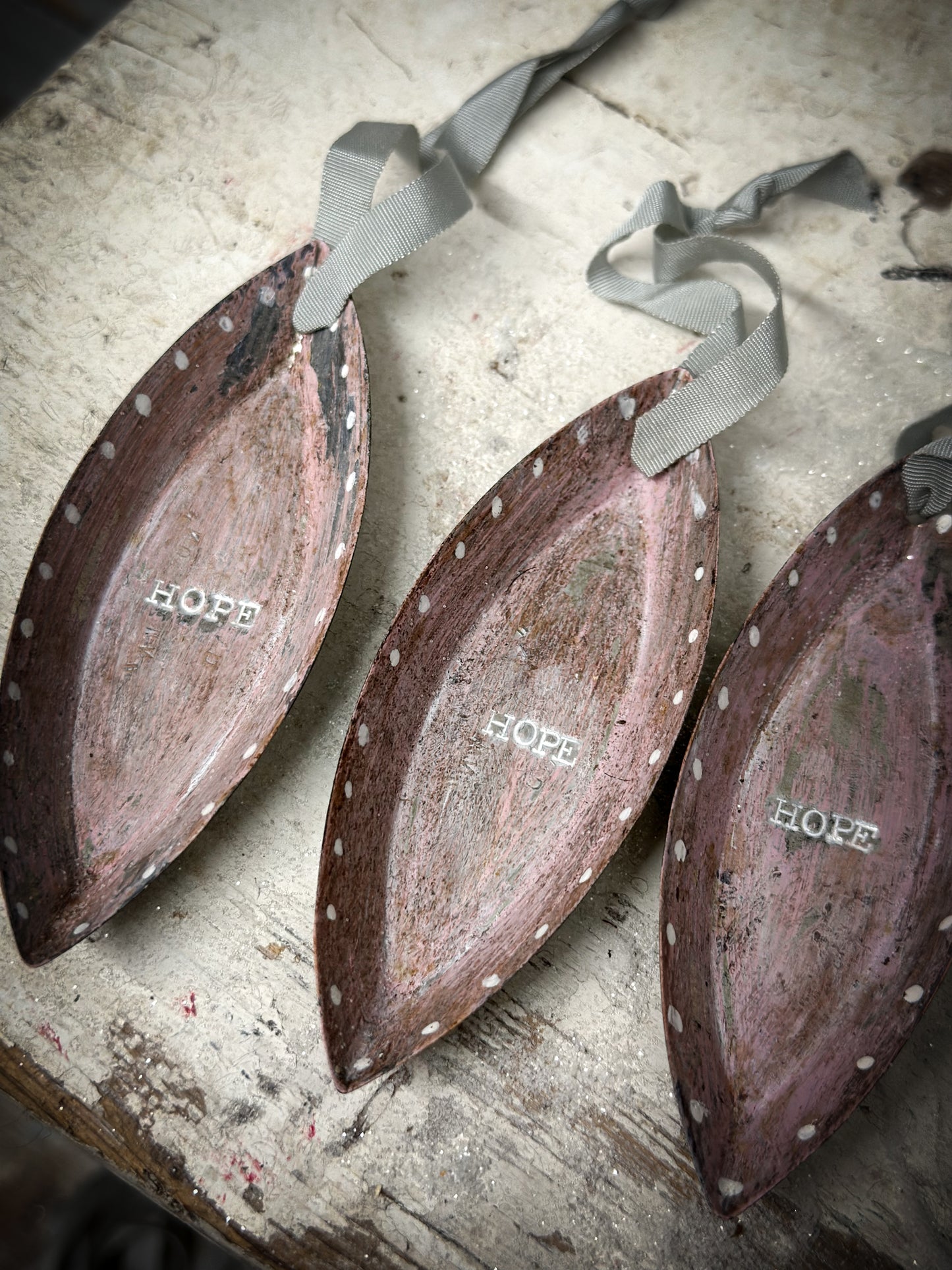 A Reworked French Patisserie Tin Christmas Decoration Stamped and Painted “Hope”