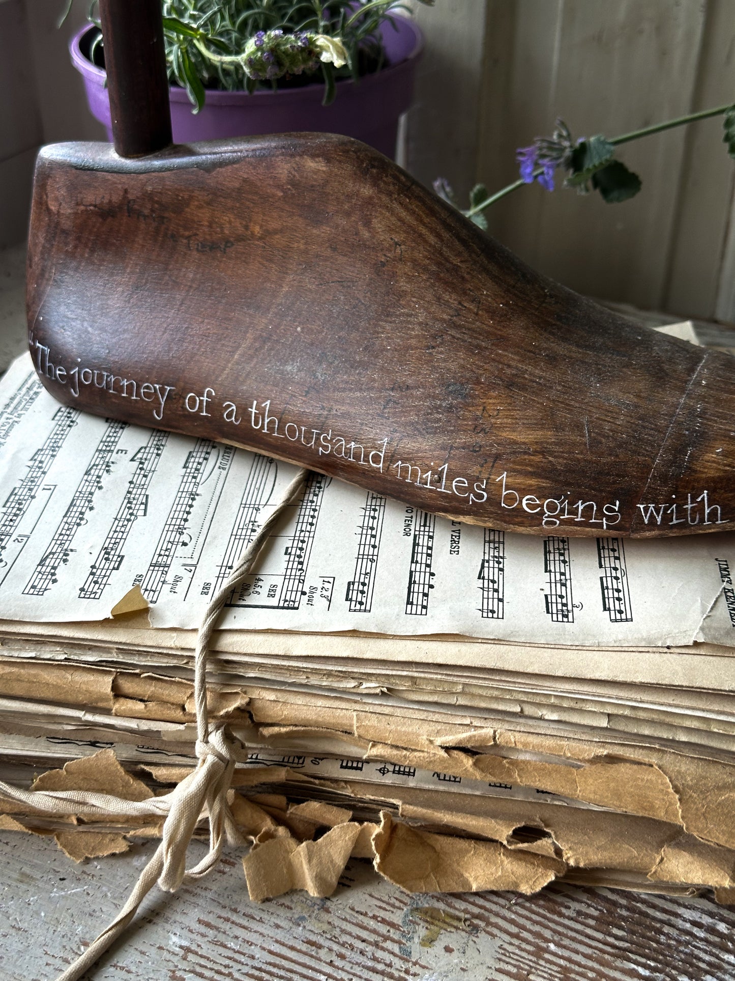 An antique wooden painted adult’s shoe last.