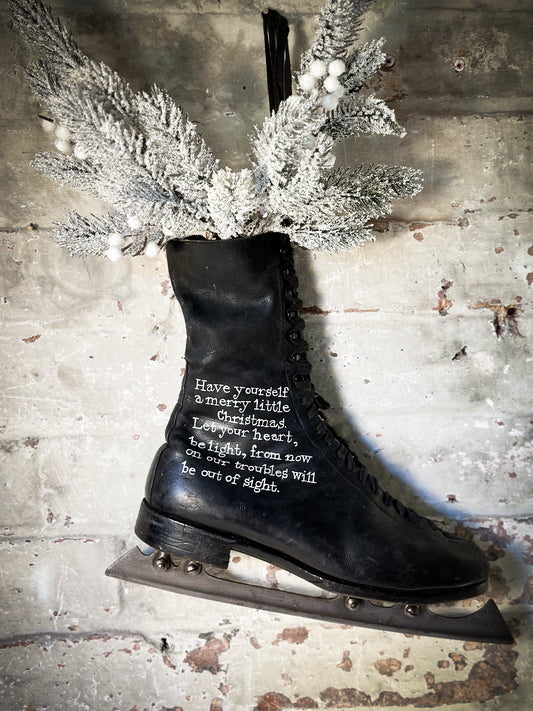 A beautiful vintage Christmas ice skate hand painted using traditional sign writer’s techniques and materials