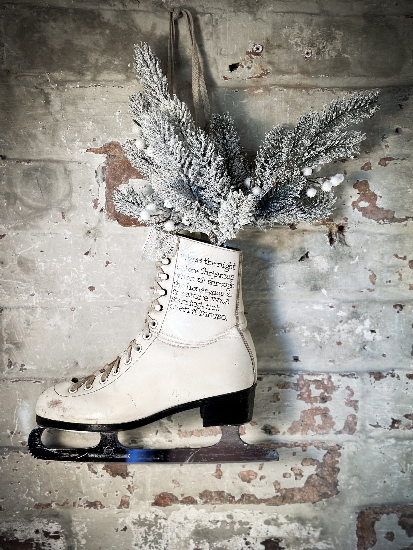 A beautiful vintage Christmas ice skate hand painted using traditional sign writer’s techniques and materials