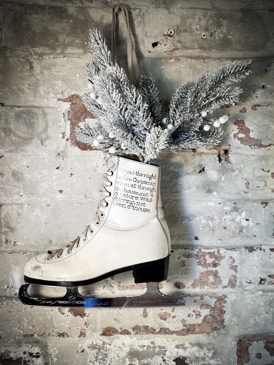 A beautiful vintage Christmas ice skate hand painted using traditional sign writer’s techniques and materials