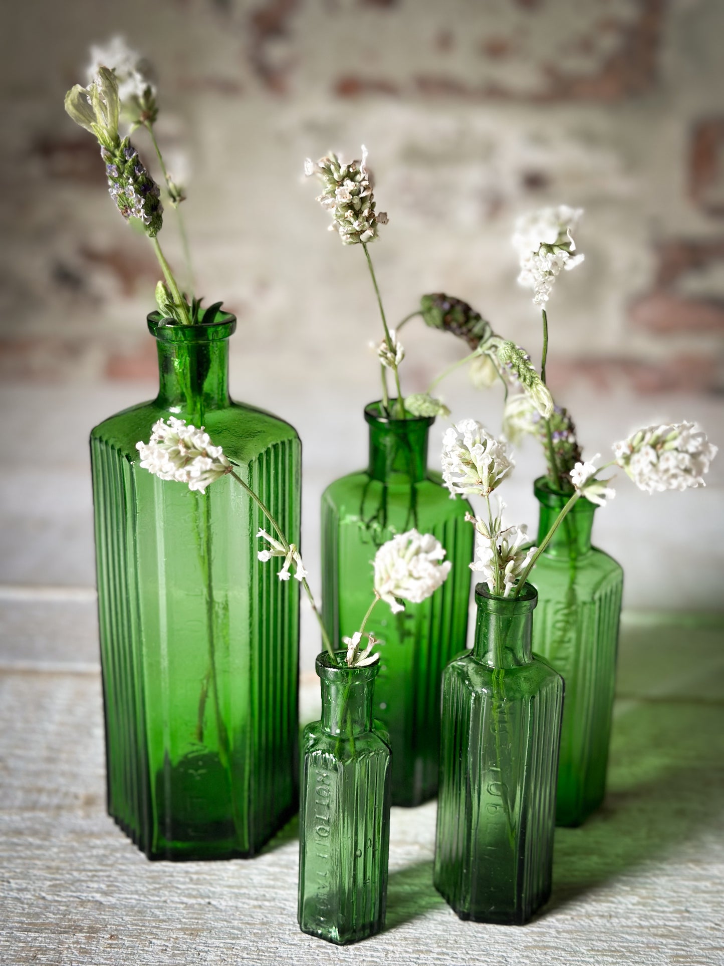 A set of Five lovely antique green poison bottles