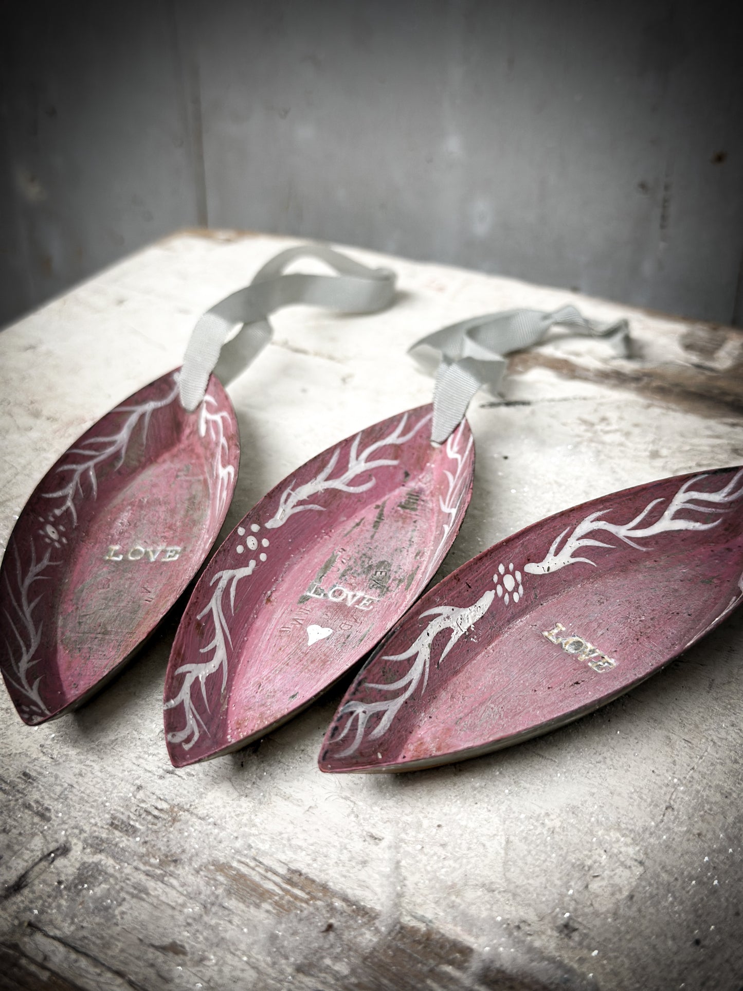 A Reworked French Patisserie Tin Christmas Decoration Stamped and Painted “love”