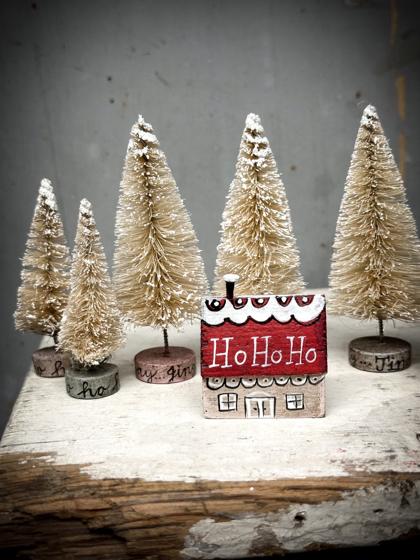 A small Vintage German Erzgebirge Putz Wooden Village House “Ho Ho Ho”