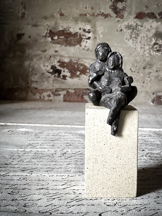 A Vintage Mini Sculpture of an Embracing Couple