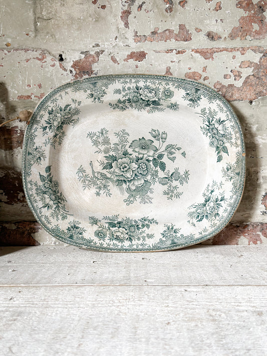 A stunning antique green and white transfer ware roast chicken plate