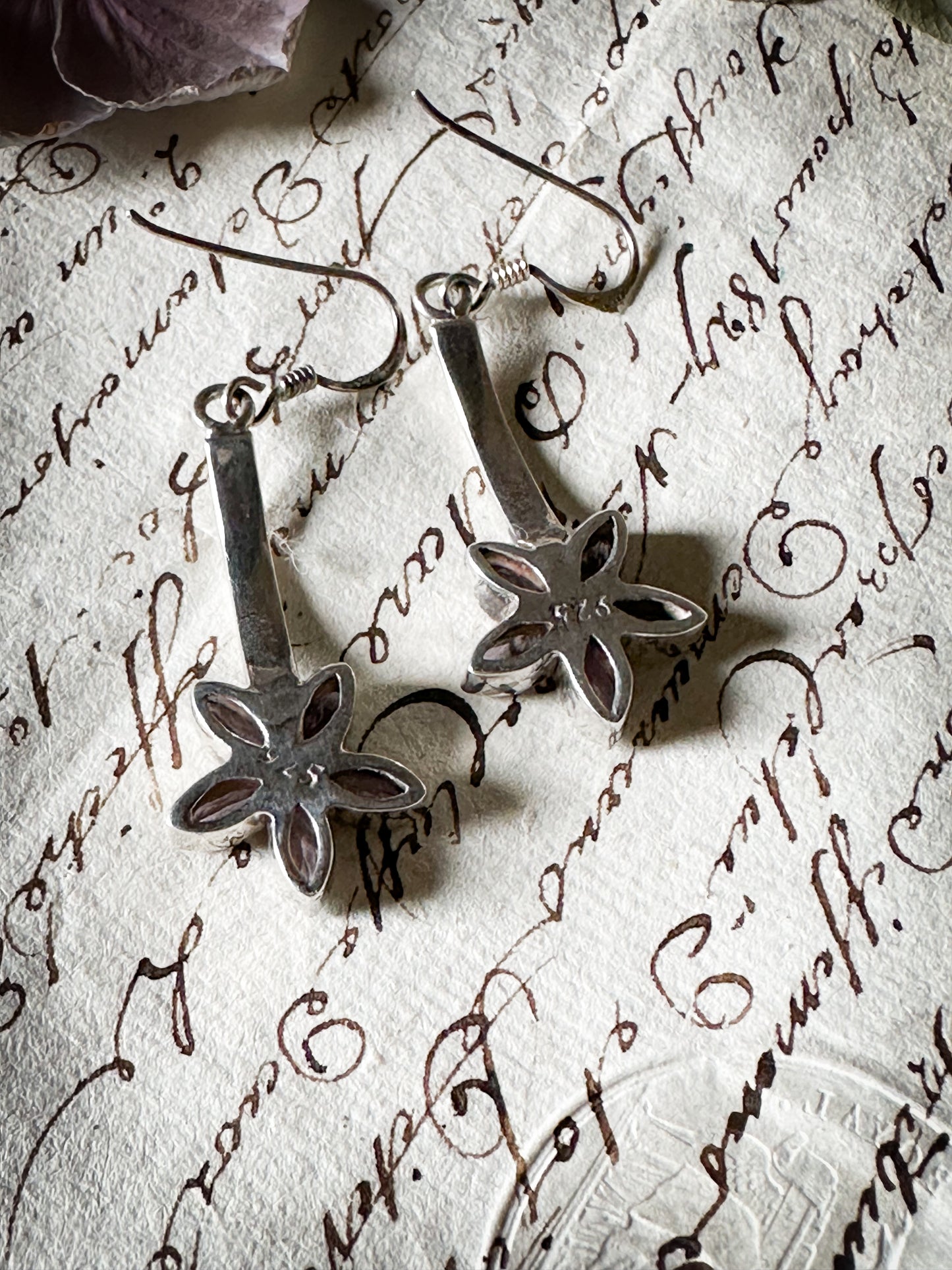 A pair of vintage silver amethyst flower drop earrings