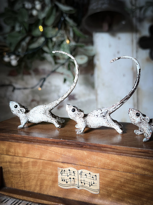 A cold painted brass “night before Christmas mouse”